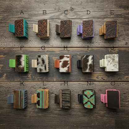 Various decorative clips with different patterns and colors on a wooden background